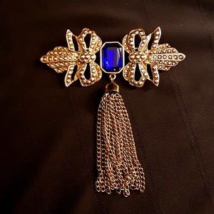 Goldtoned Brooch With Royal Blue Stone and Tassel Signed A.J.C.